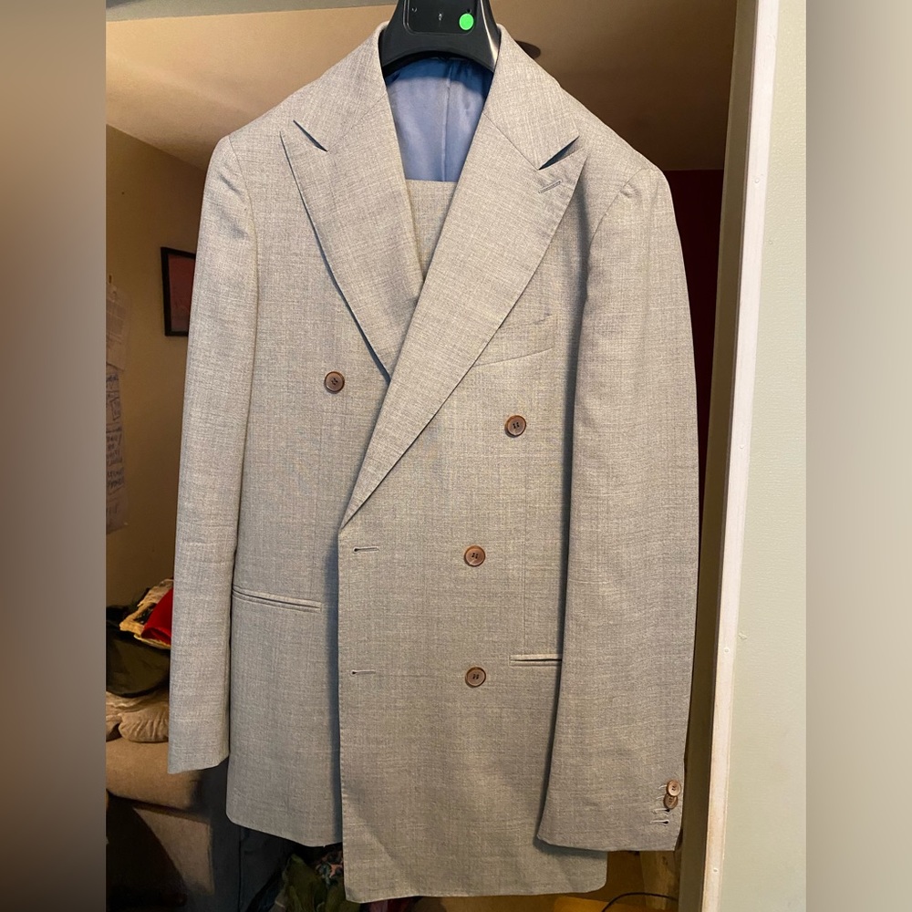 Suitsupply light brown double breasted suit.